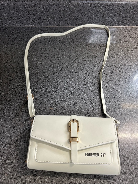 Forever 21 Handbags - Forever 21 White Crossbody Bag with Gold Buckle